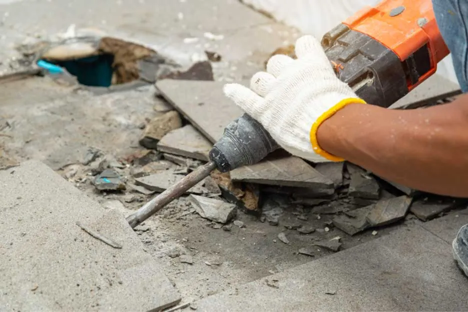 Licensed C21 contractor demolishing old tile floor