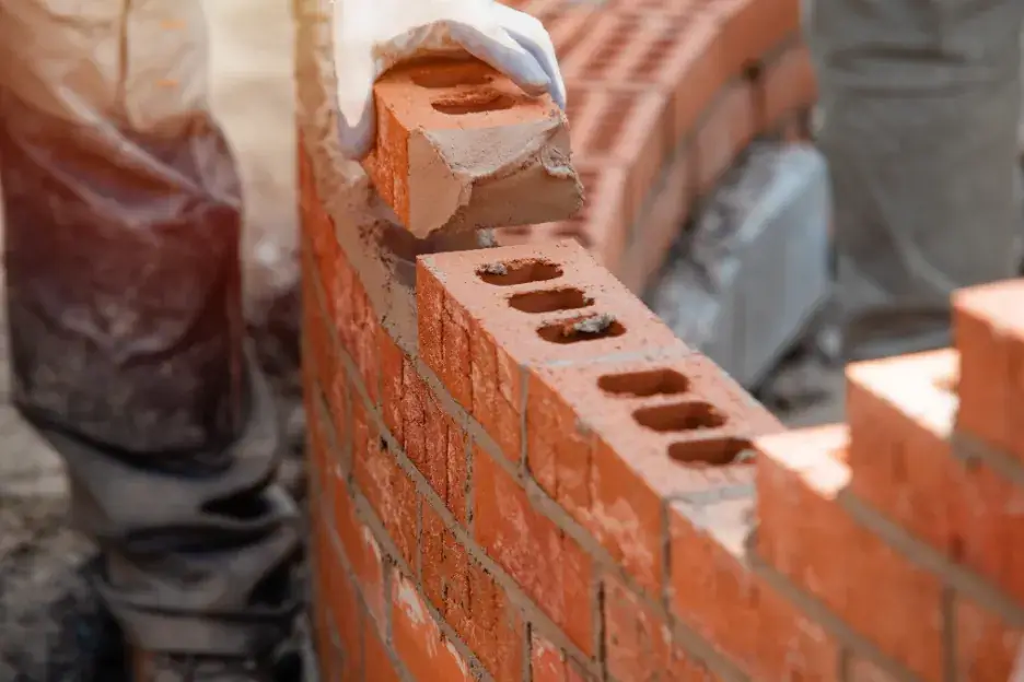 Licensed C29 contractor laying brick