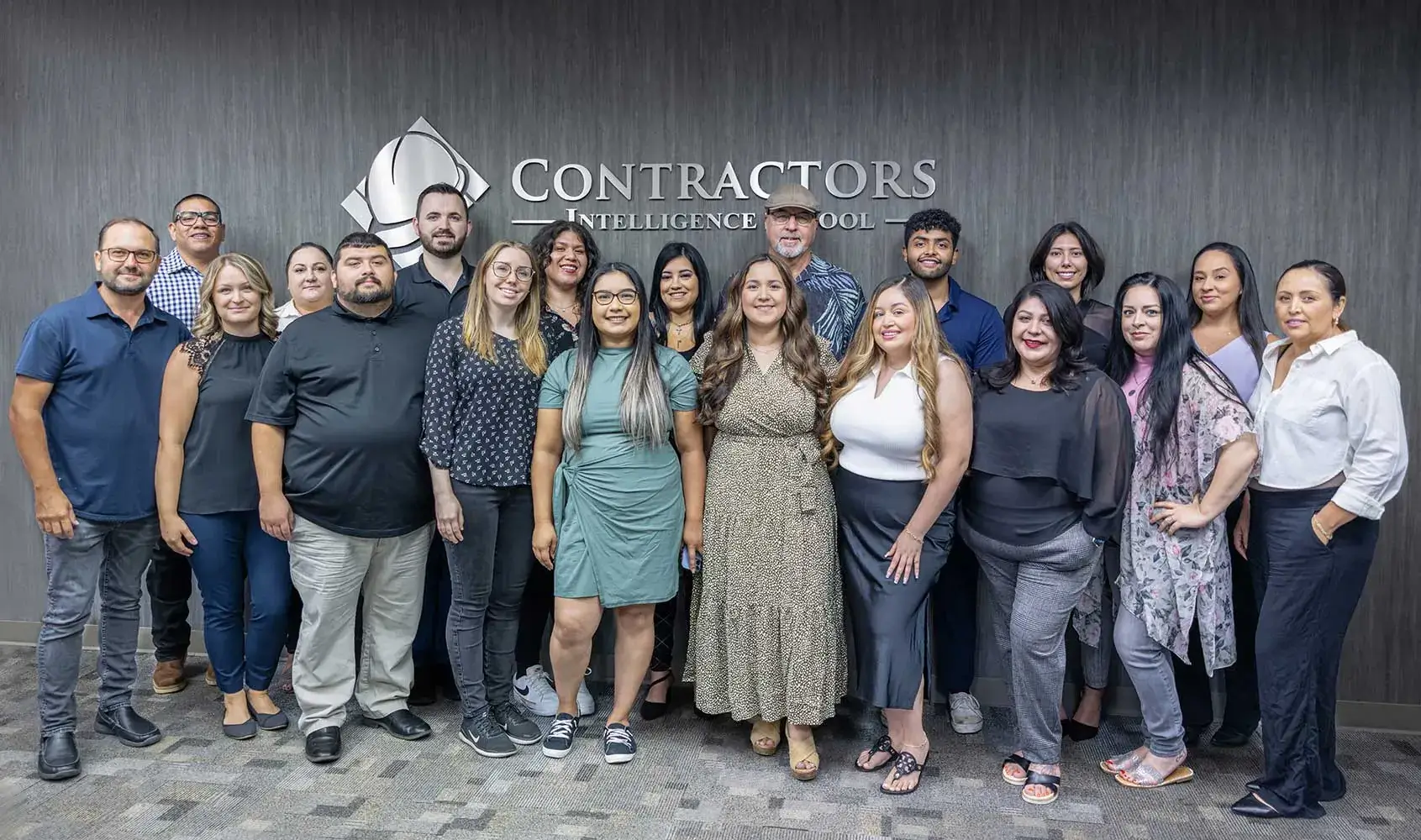 Group photo of the team members at Contractors Intelligence School, showcasing the diverse and friendly staff who support students in obtaining their contractor licenses in California.